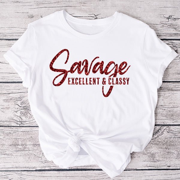 Our Black Savage Excellent & Classy shirt with gold glitter print. Pairs well with Plaid shirt, jeans and more. Can be dressed up or dressed down.