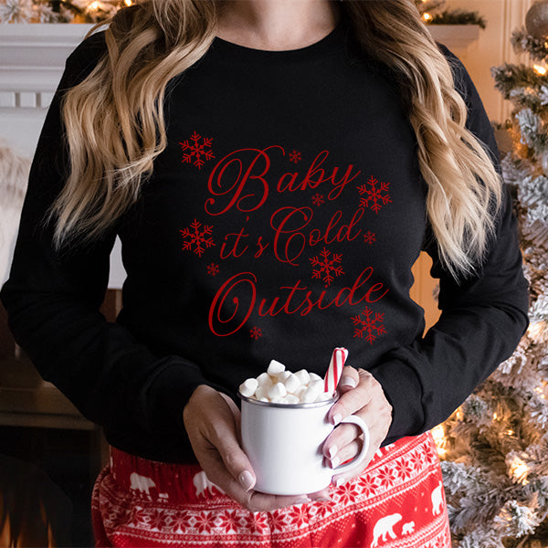 Black long sleeve tshirt with Baby Its Cold Outside print. Pair with holiday pajama pants or jeans for a nice holiday cheer look. all SKUs