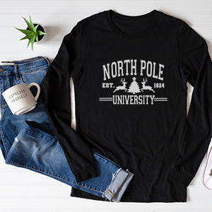 Flat Lay of North Pole University Long Sleeve Tshirt in Black with white lettering and design. all SKUs