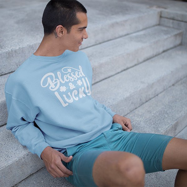 Our Blessed and Lucky shirts is sure to catch some looks. You can choose your print color that is available in both standard and glitter print. It features a few clovers and a horseshoe symbol.