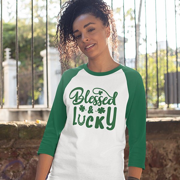 The Blessed and Lucky Design is shown on a Raglan Shirt with white and green 3/4 sleeves. This is a cool Christian shirt that is gender neutral.