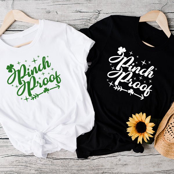 Pinch Proof Shirts for St Paddys Day Outfits. Choose from White, Black, Sand, Grey and more. Customized your shirt by selecting your print color.