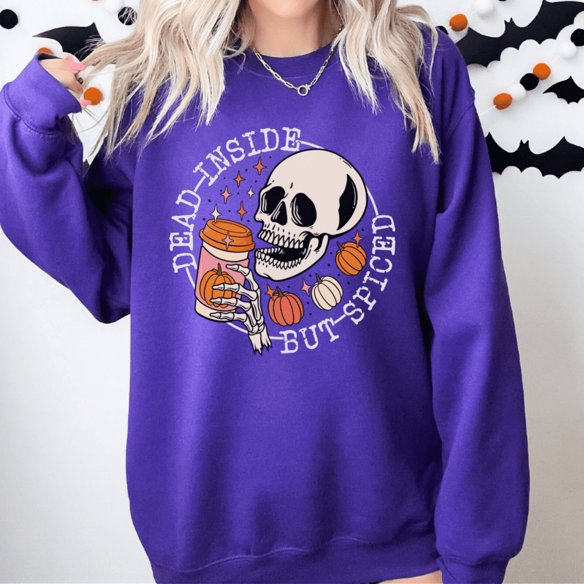 Halloween Sweatshirt with a skeleton sipping a seasonal drink. all SKUs