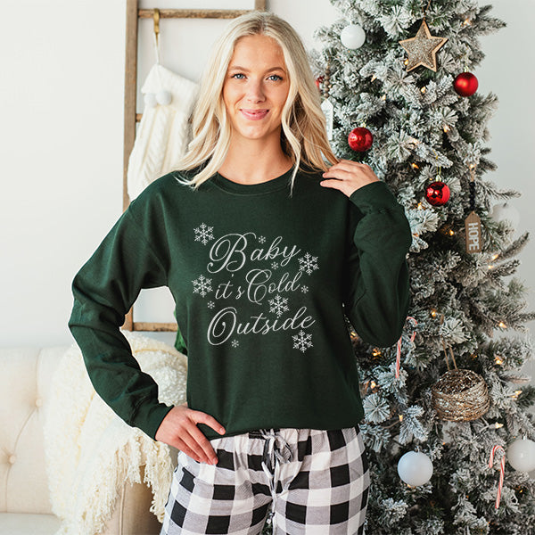 Green Gildan 18000 Sweatshirt with text Baby It's Cold Outside. A Womens Christmas Sweatshirt for the holiday season. all SKUs