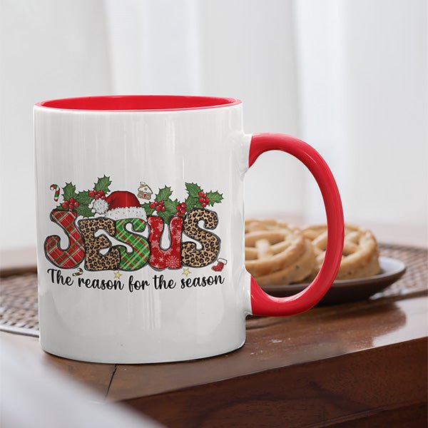 Jesus is the reason for the Season ceramic mug for hot chocolate and coffee. Featuring a white mug with red handle.