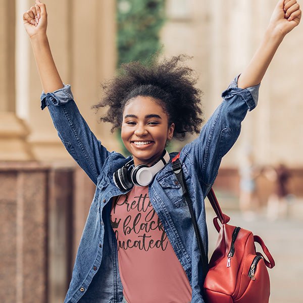 Our Pretty, Black and Educated Tshirt is a perfect Black Girl Magic Shirt. Use as a Melanin Shirt, Black History Month shirt and more. Available in a variety of sizes and colors.