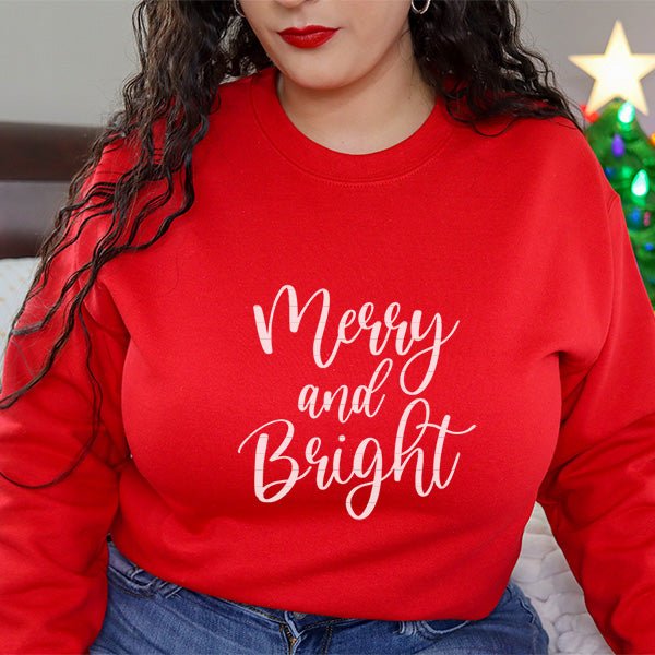 Merry and Bright Christmas Sweatshirt available in Womens and Womens Plus sizes. all SKUs