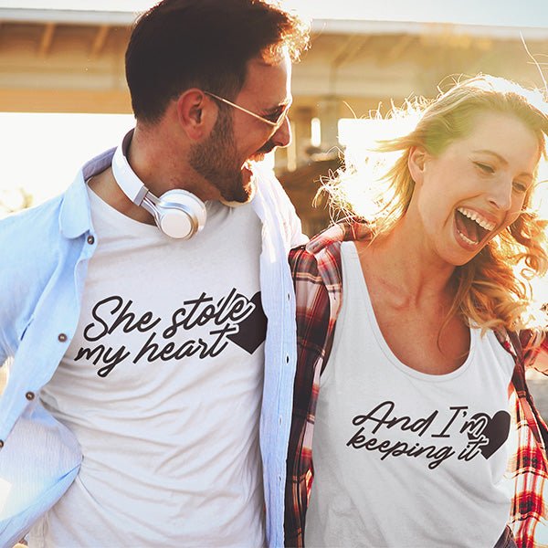 Couple Hoodies, couple sweatshirts, couple tshirts and couples tank tops are available with the words She Stole My Heart… And I'm keeping it. all SKUs