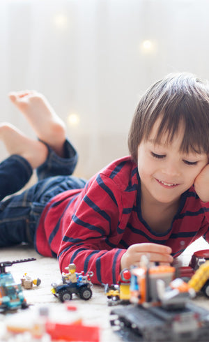 6 to 10 Years Toys - School Age Boy Playing with Toys