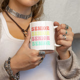 Woman holding 2024 senior class coffee mug. Perfect gift for class of 2024 graduates. All SKUs. 