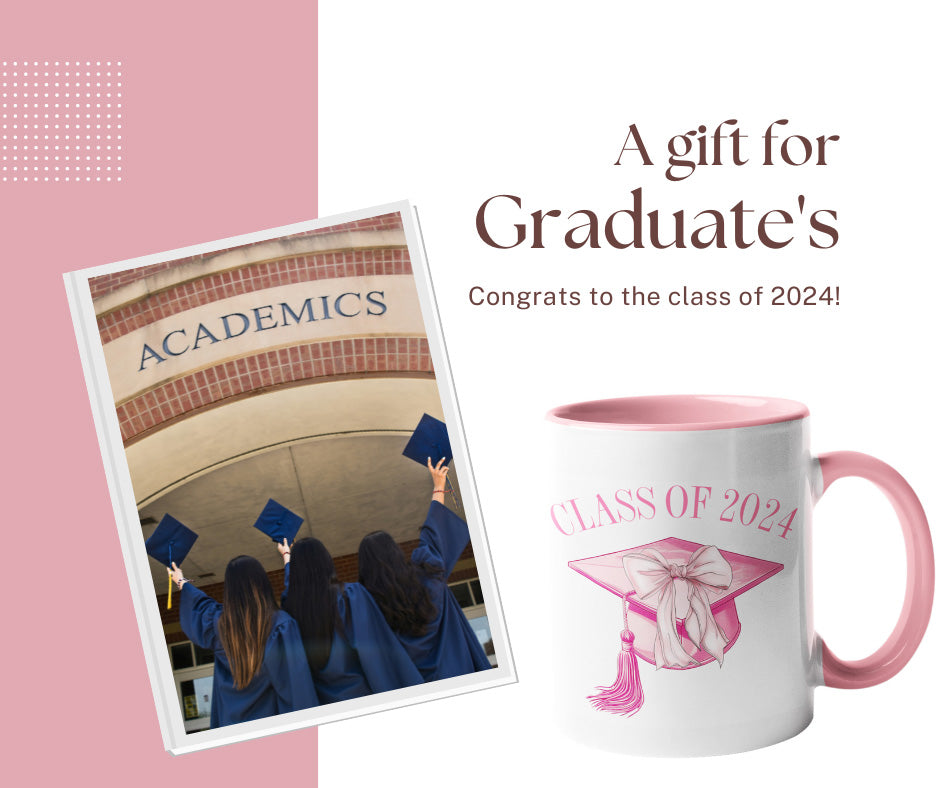 College graduates celebrating next to a pink class of 2024 graduation coffee mug. All SKUs. 