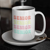 2024 Senior class coffee mug sitting on small plate with spoon. Congrats to the class of 2024. All SKUs.