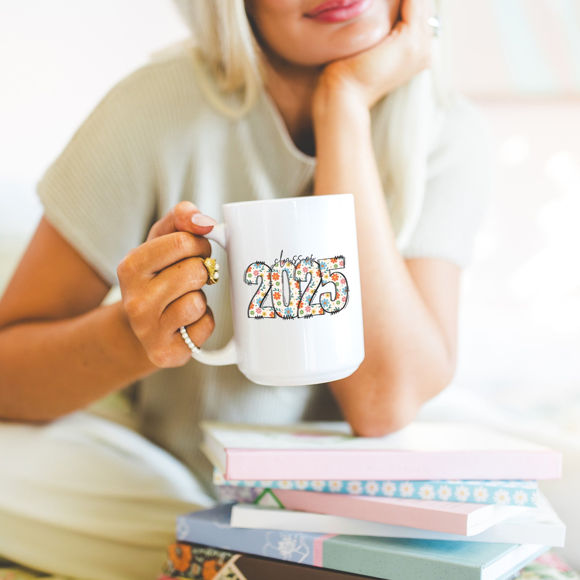 Senior keepsake gift for female graduation. Chic and cute Class of 2025 mug with feminine floral design. 