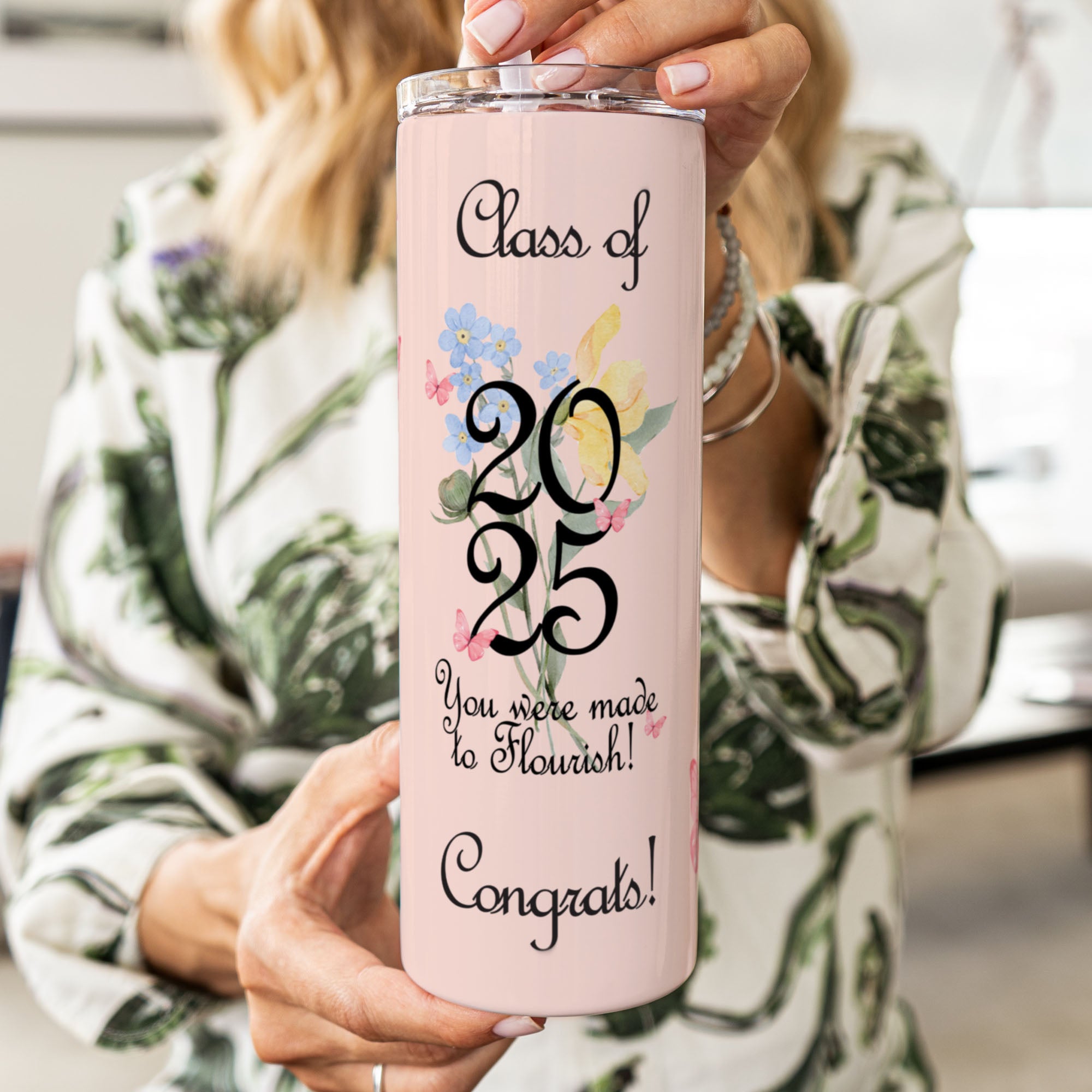 This Floral Coquette Graduation Tumbler with a sophisticated floral design is an ideal gift for female graduates in the Class of 2025.