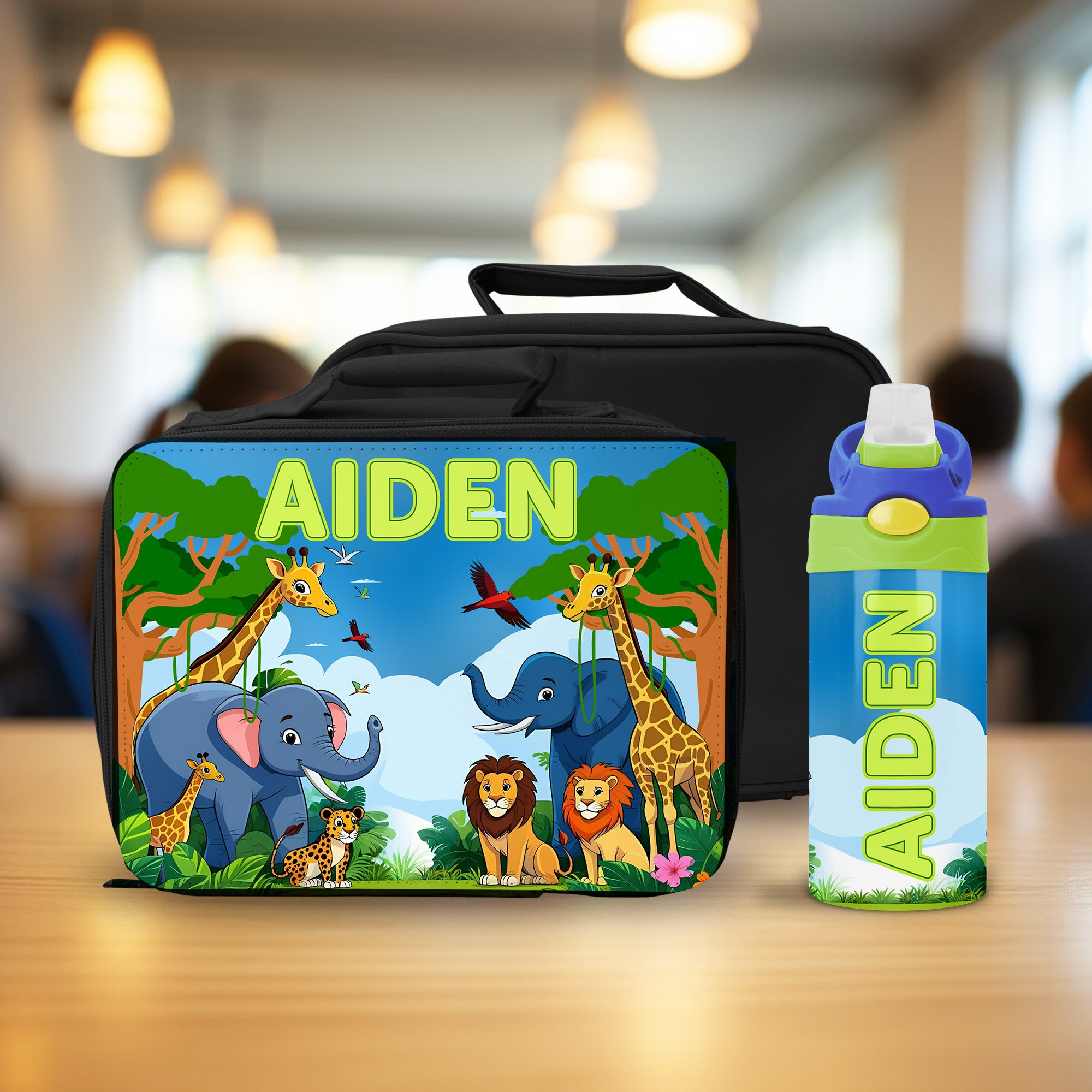 Back to school personalized lunch box and matching water bottle set featuring safari animal design for boys.