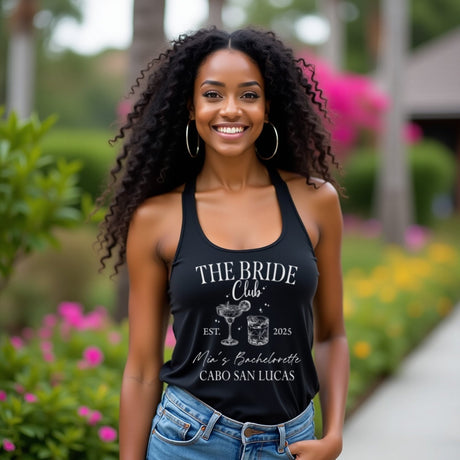 A Bride wearing a matching bridal party shirt, with custom name and location. The perfect gift for brides, and bridal party's. 