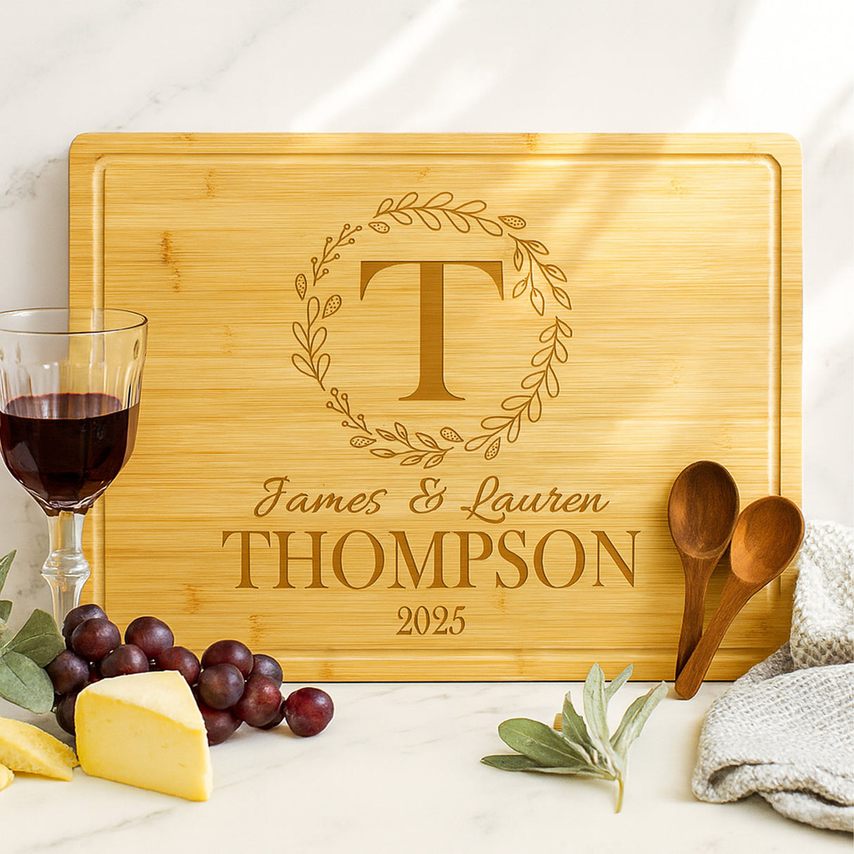 Wood bamboo personalized cutting board gift for couples with names, last name, initial and wedding year.