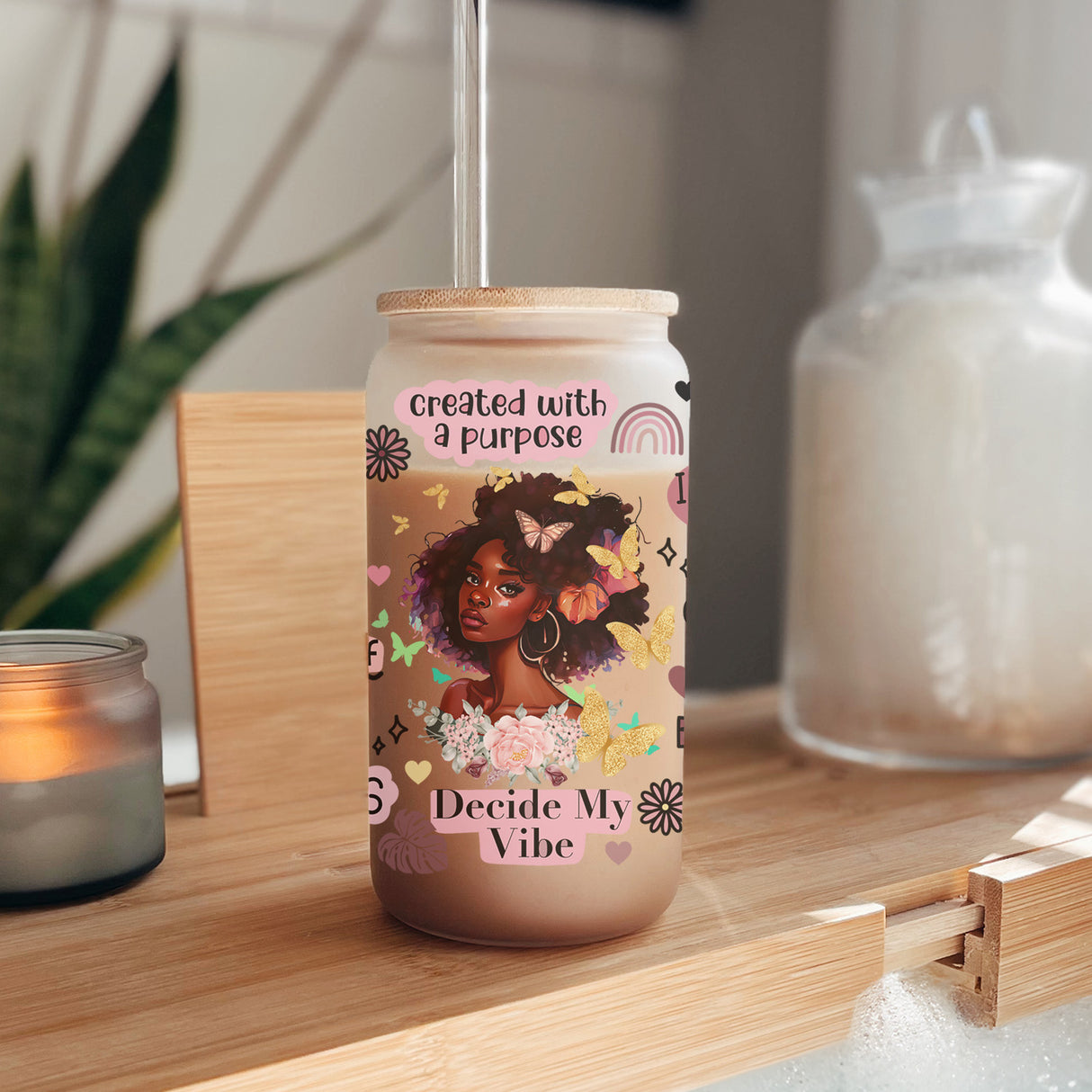 This frosted iced coffee tumbler holds 16oz and features a beautiful image of a black woman with the words created with a purpose.