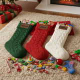 Cable knit Christmas stockings with names personalized on leather patches. 