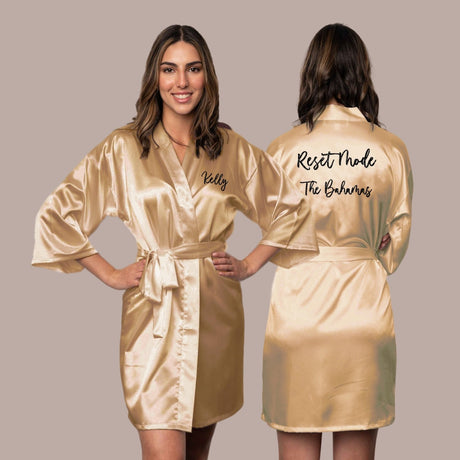 Custom champagne gold robe with personalized text. 