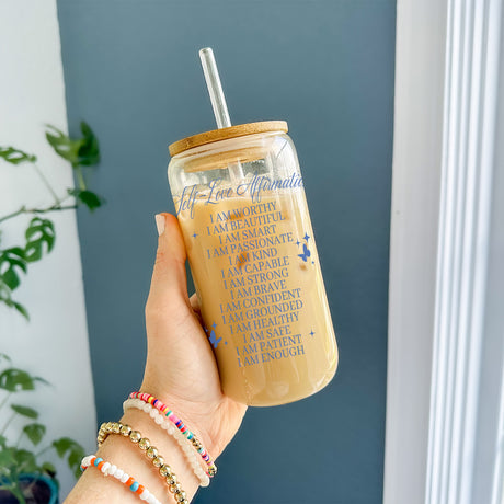 Clear Iced Coffee Cup with self love affirmations. Phrases include I am capable, I am Strong, I am Brave and more.