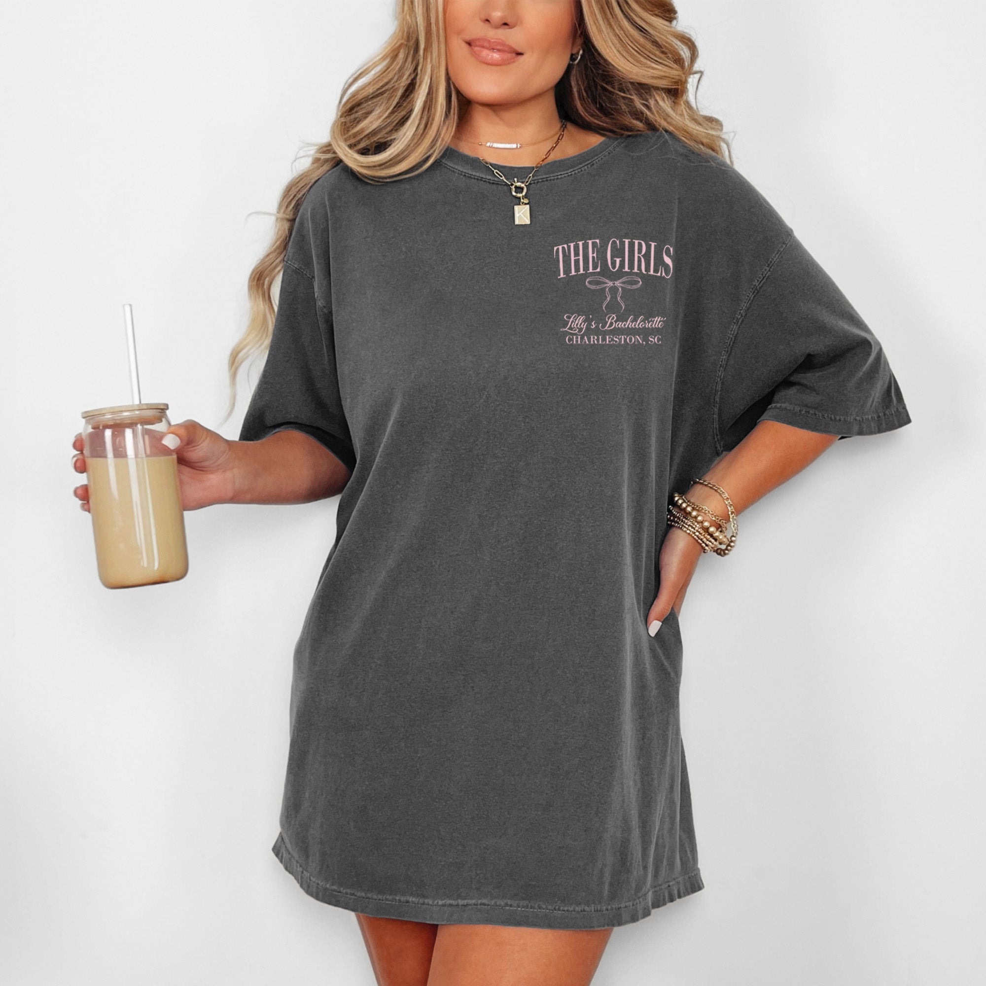 Custom coquette bow bridal shirt, ideal for wedding party keepsakes, personalized with names and location for bride and bridesmaids.