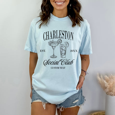 Comfort Colors bride shirt with custom city name, a trending gift for bride to be and favorite for matching bachelorette party outfits.