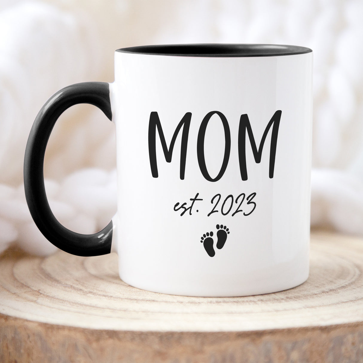 Personalized baby feet coffee mug with sentimental design, a thoughtful gift for expecting mothers or new parents.