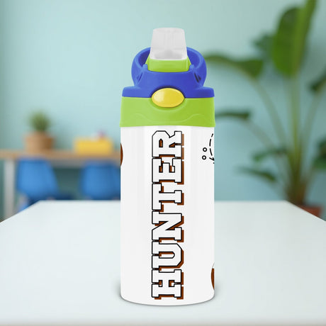 The football-themed sippy cup is ideal for toddlers to use at school. This kids back-to-school tumbler features a custom football design and name.