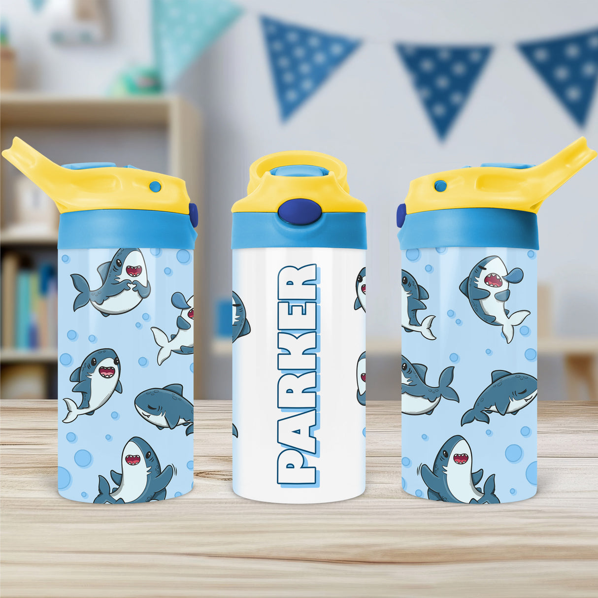 Kids custom water bottle with bold shark print, ideal for personalized back to school gifts.