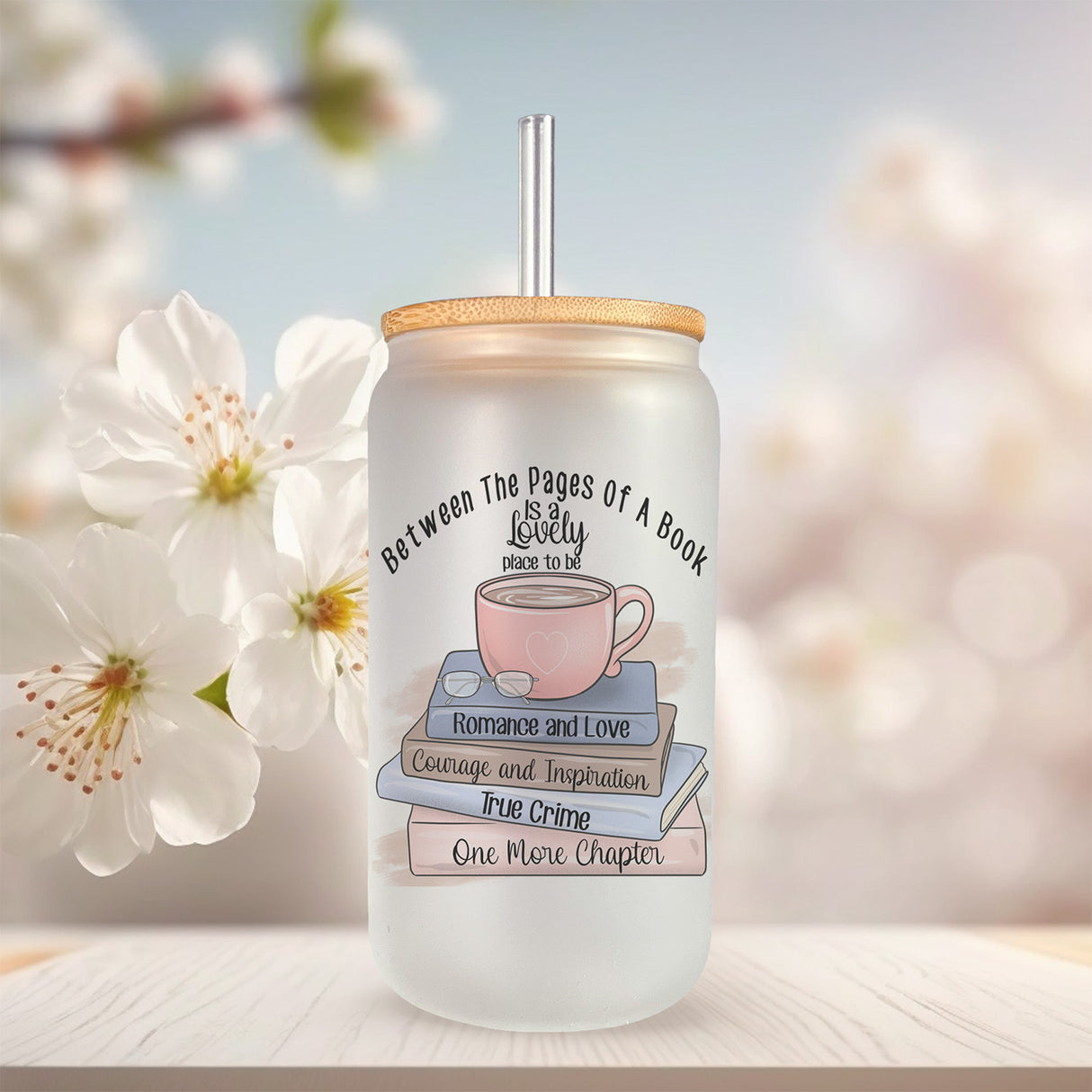 Cute gifts for book lovers. 16oz frosted iced coffee glass tumblers for book lovers. The cup design mentions a few book genre favorites like romance and love, true crime, and courage and inspiration. Cute one more chapter iced coffee cup.