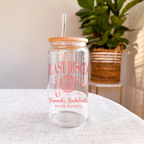 Custom Last Disco iced coffee glass with lid, personalized for bride and bridesmaids as fun bachelorette party drinkware and gifts.