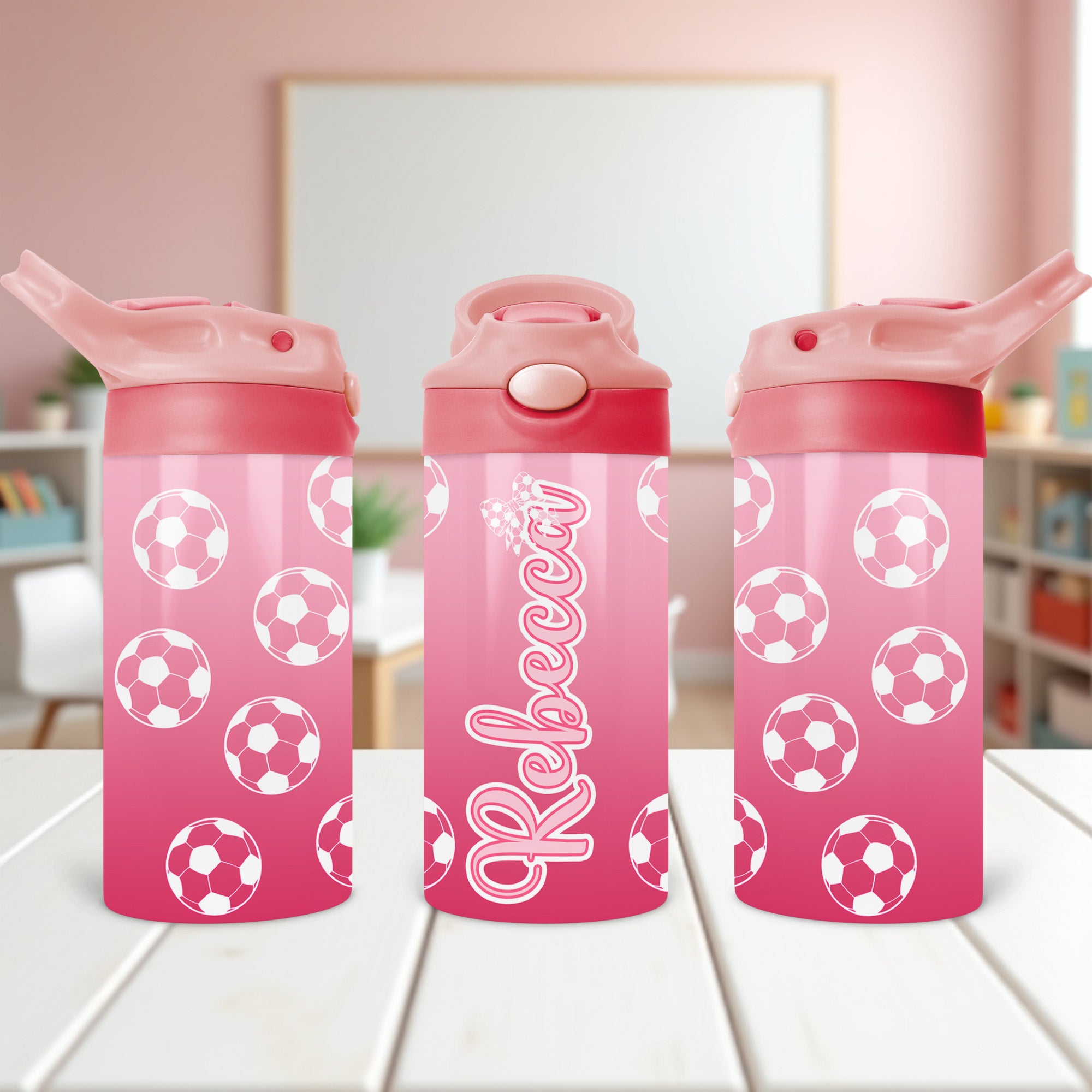 Personalized pink soccer water bottle for girls with custom name, perfect for school and sports.