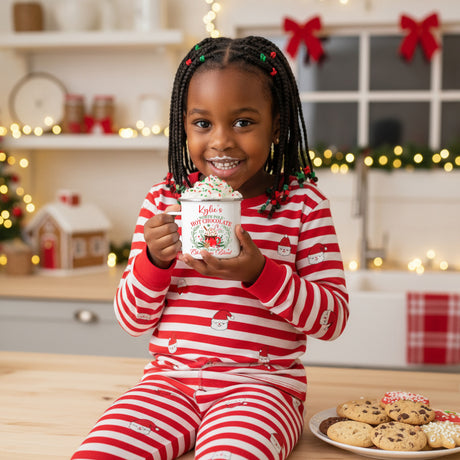 Cute personalized Christmas mugs for kids and adults with name and north pole hot chocolate design. 