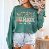 Custom Floral Pastel sweatshirt worn by girl, celebrating her Class of 2025 graduation.