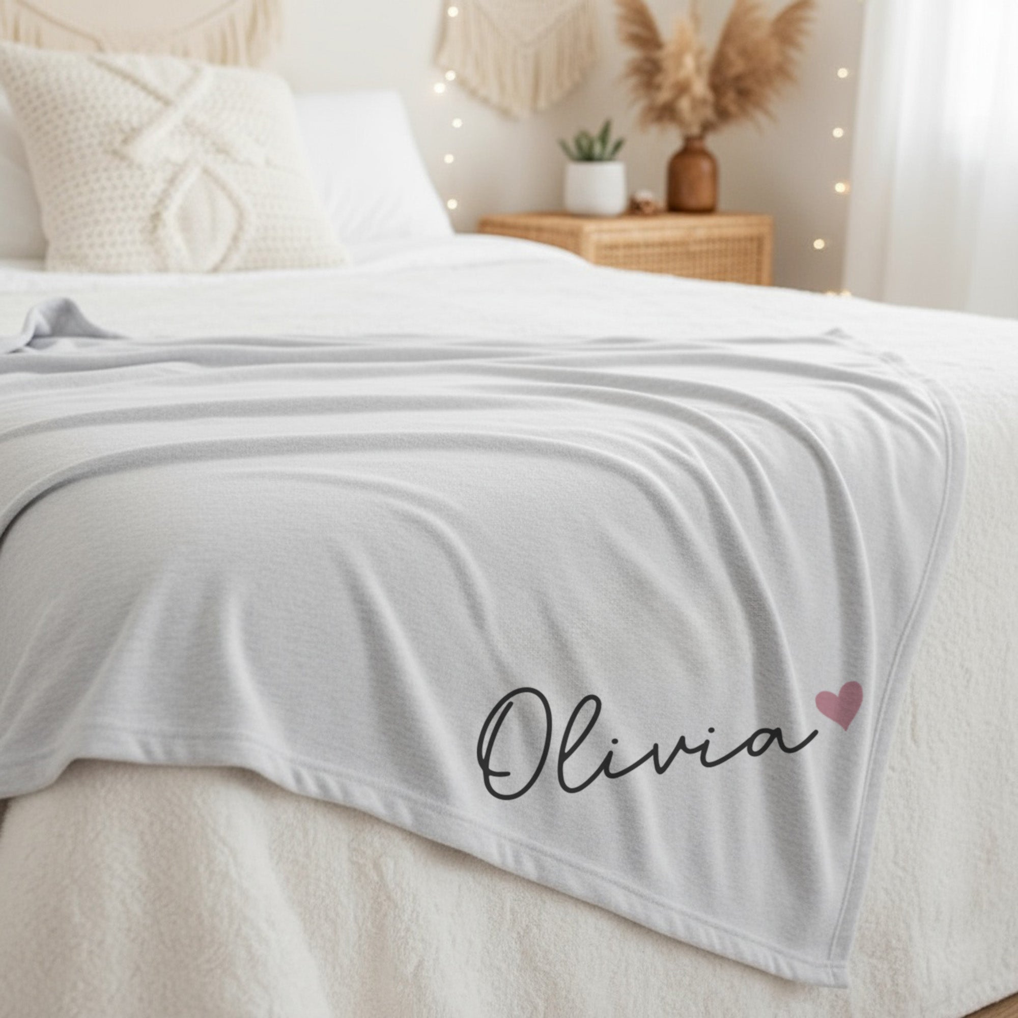 Personalized throw blanket for girl's bedroom or college dorm room, custom with name. 