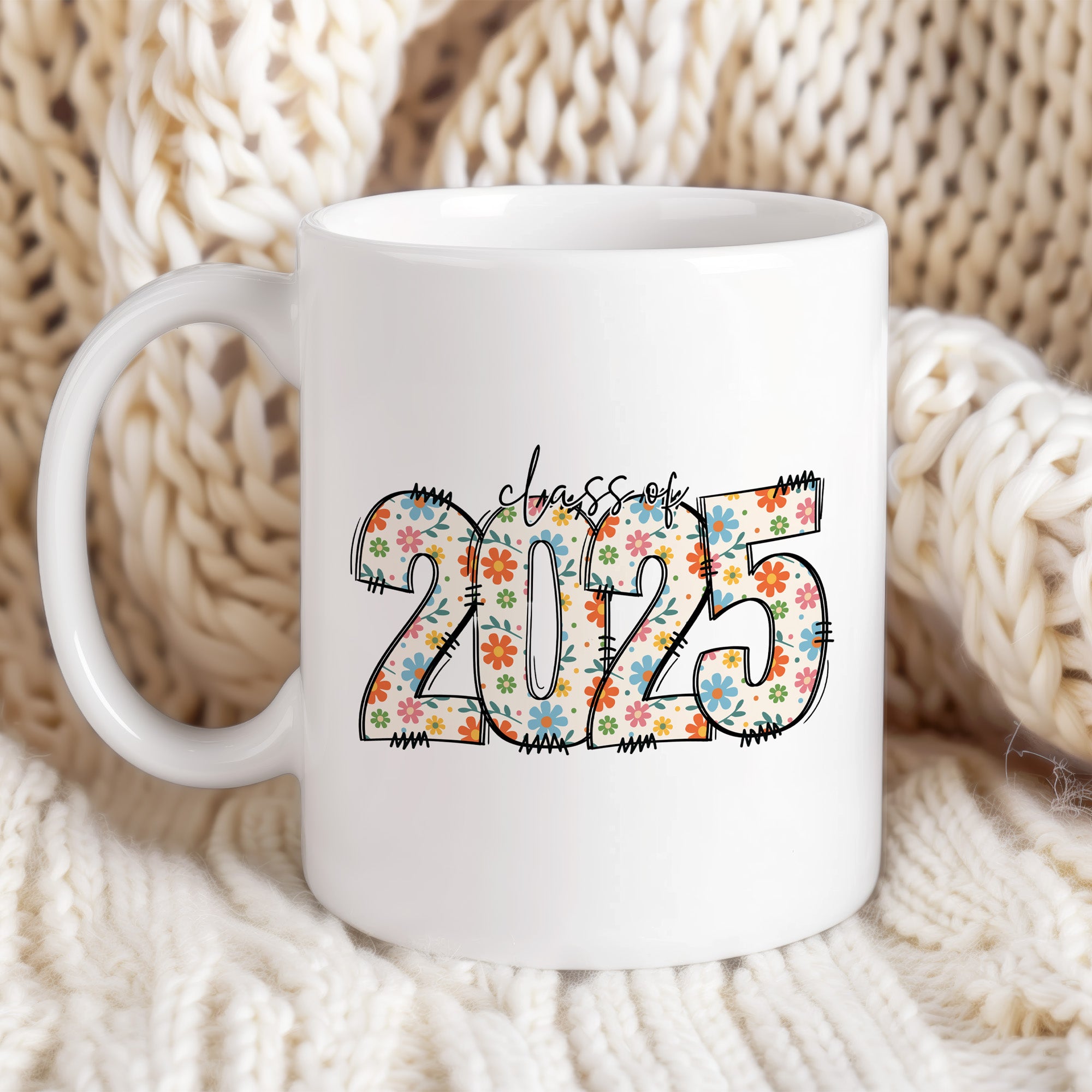 Graduation gift mug for women with colorful flowers and Class of 2025. design. Stylish graduation mug with floral accents.