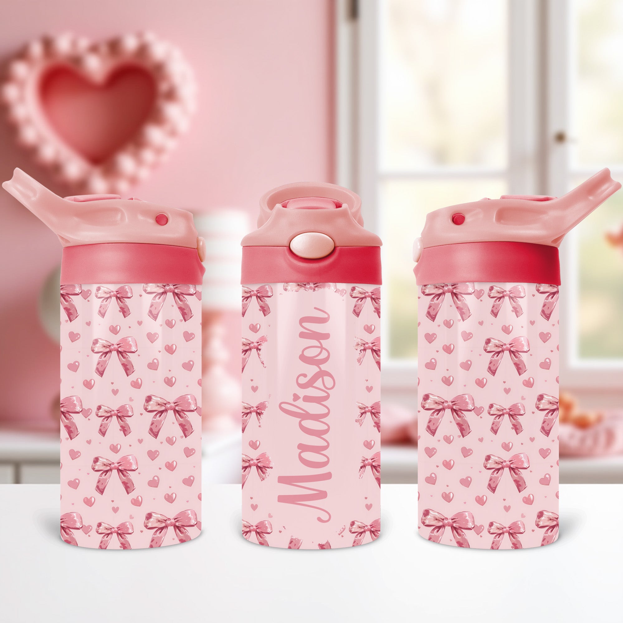 Custom kids water bottle with coquette bow design and name personalization, perfect for daycare or preschool.
