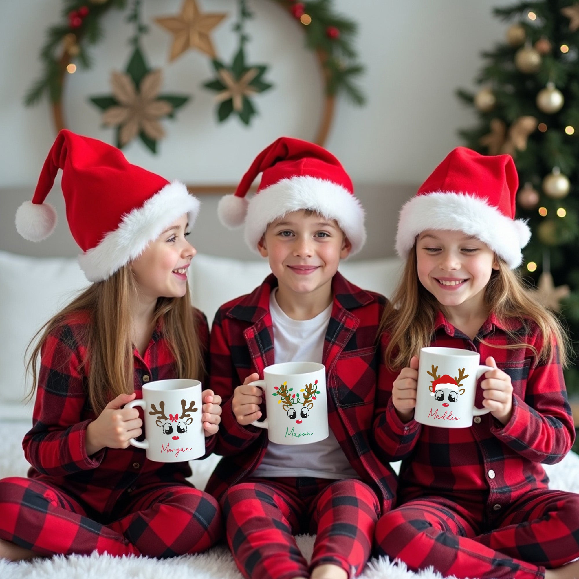 Christmas mugs for kids personalized with their names and a reindeer of your choosing.