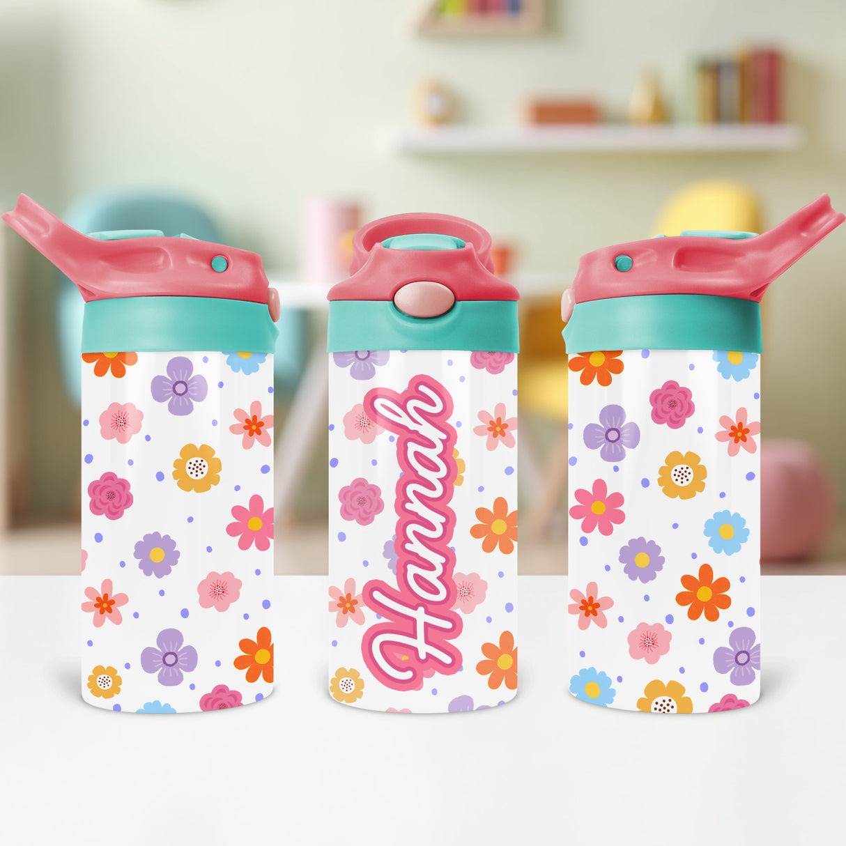 Back-to-school floral water bottle with name. The perfect pink sippy tumbler gift for little girls. 