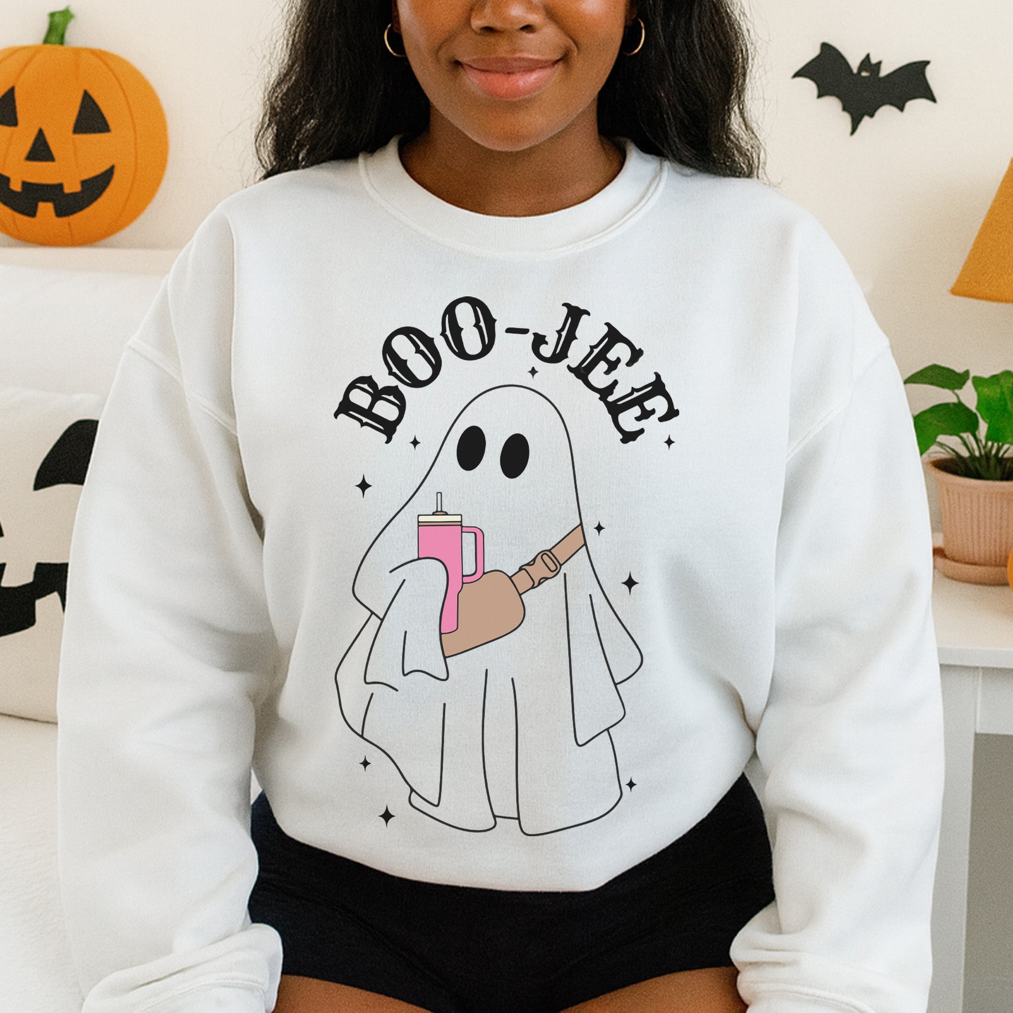 Halloweentown Sweatshirt with a cute ghosts holding a pink tumbler and a messenger style bag with the appropriate words of Boo-Jee. all SKUs