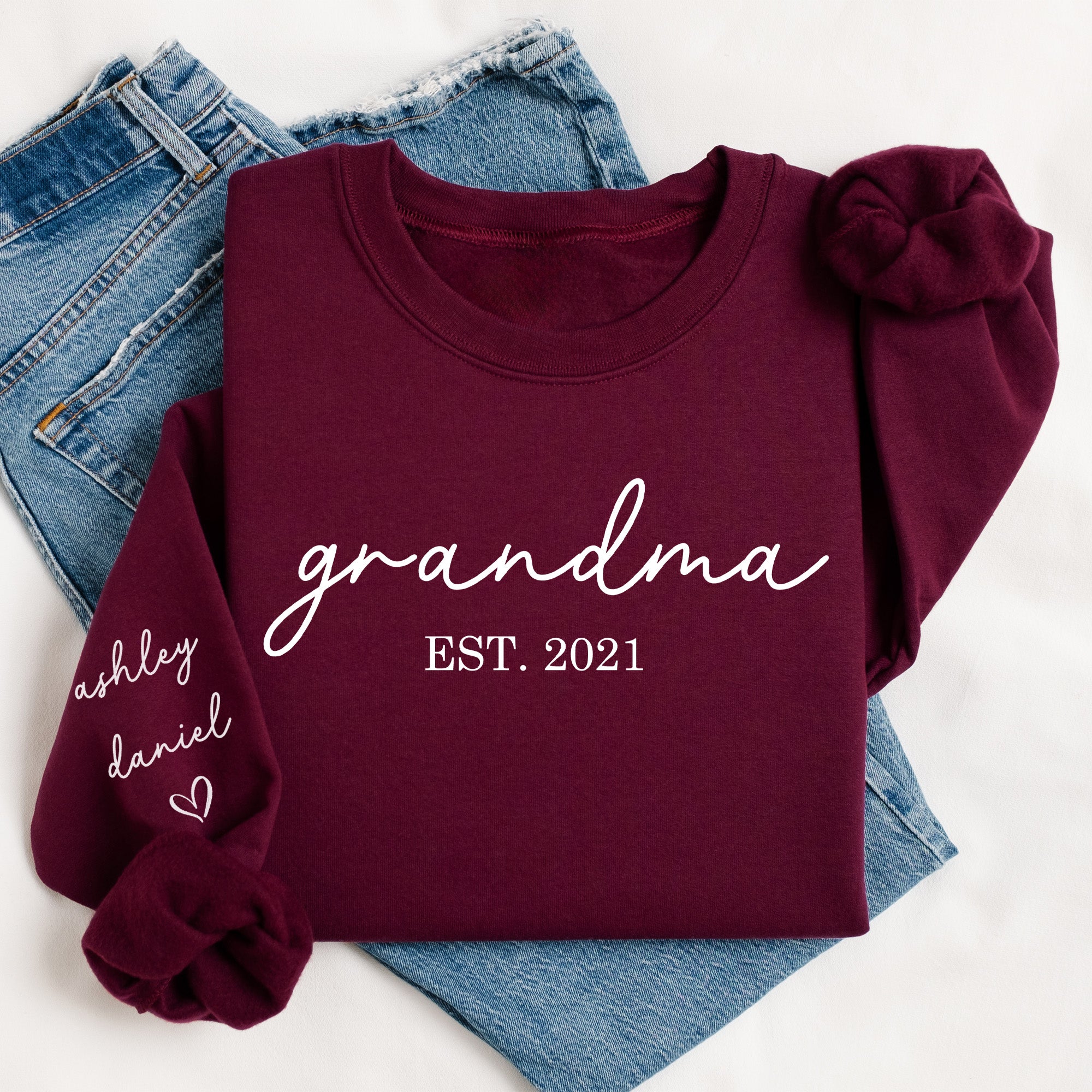 Gift for grandmother with personalized sleeve detail shown. Sweatshirt for grandma with kids names on sleeve. 