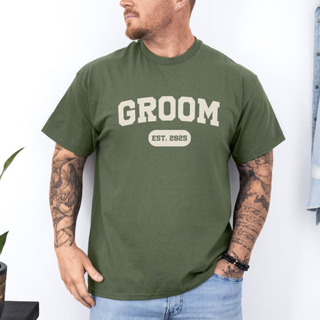 Groom EST year shirt featuring personalized lettering, perfect bachelor party apparel for pre-wedding celebrations.