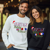 Couple wearing their County Heritage Holiday sweatshirts.  One has a France Christmas shirt and the other a United Kingdom Christmas shirt. all SKUs