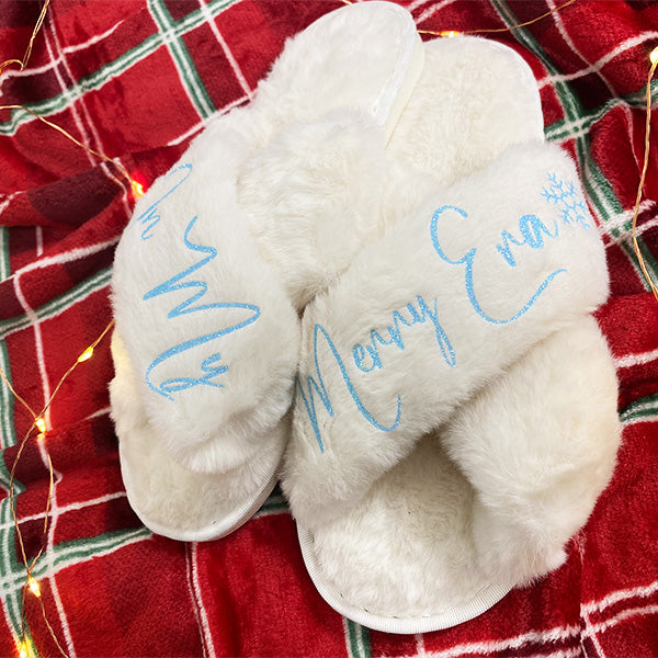 Ivory christmas slippers with In My Merry Era text and snowflake symbol.  all SKUs