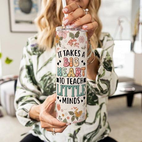 Teacher appreciation gift, custom floral tumbler with name. Women holding teacher tumbler which is the perfect gift for teachers. 