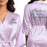 Personalized lilac quinceanera robes with gliutter designs featuring butterflies and hearts. Hermana de la quinceanera getting ready robes.