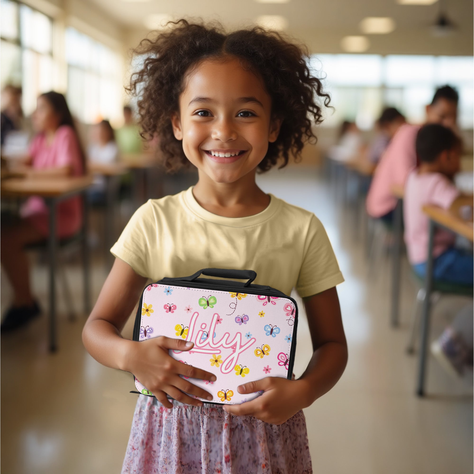 A colorful lunch box and water bottle set with name, decorated with butterflies, for girls irst day of school.