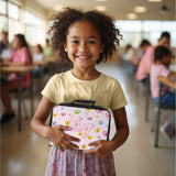 A colorful lunch box and water bottle set with name, decorated with butterflies, for girls irst day of school.