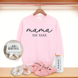 Cute gift set for mom with custom Mama sweatshirt, fluffy slippers, Libbey glass coffee can, and scrunchies. The best gift basket for mom. Personalized birthday gift for moms.